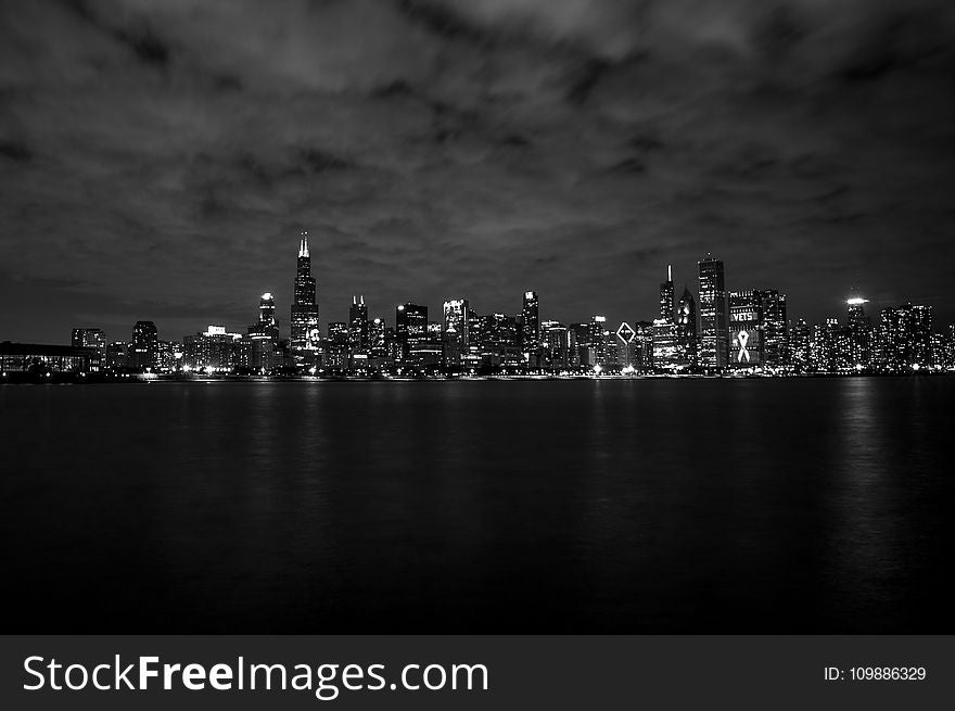 Gray Scale of City Skyline Photography