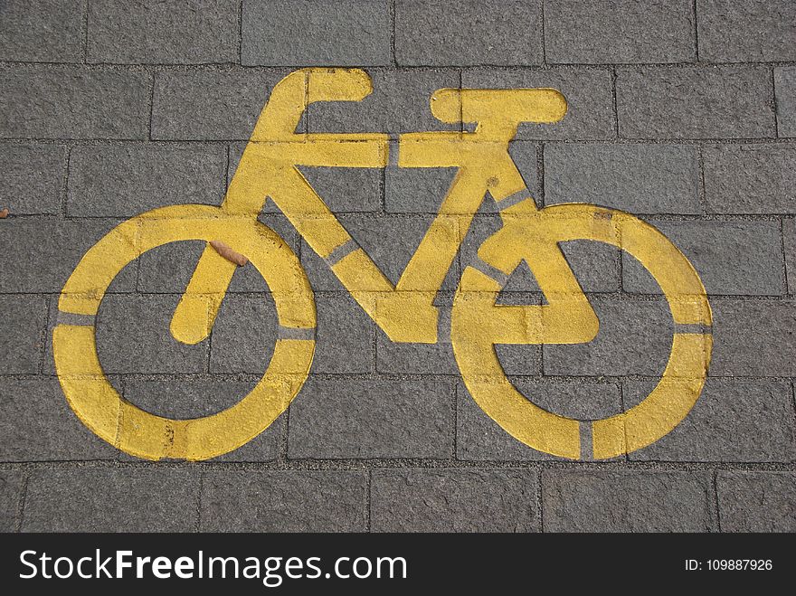 Bicycle Lane on Gray Concrete Road