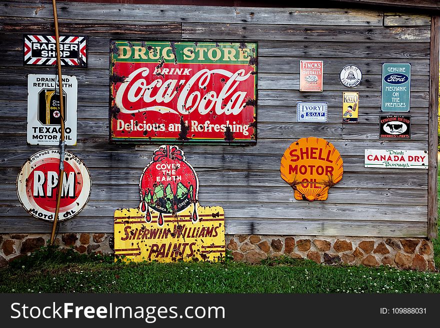 Drug Store Drink Coca Cola Signage on Gray Wooden Wall