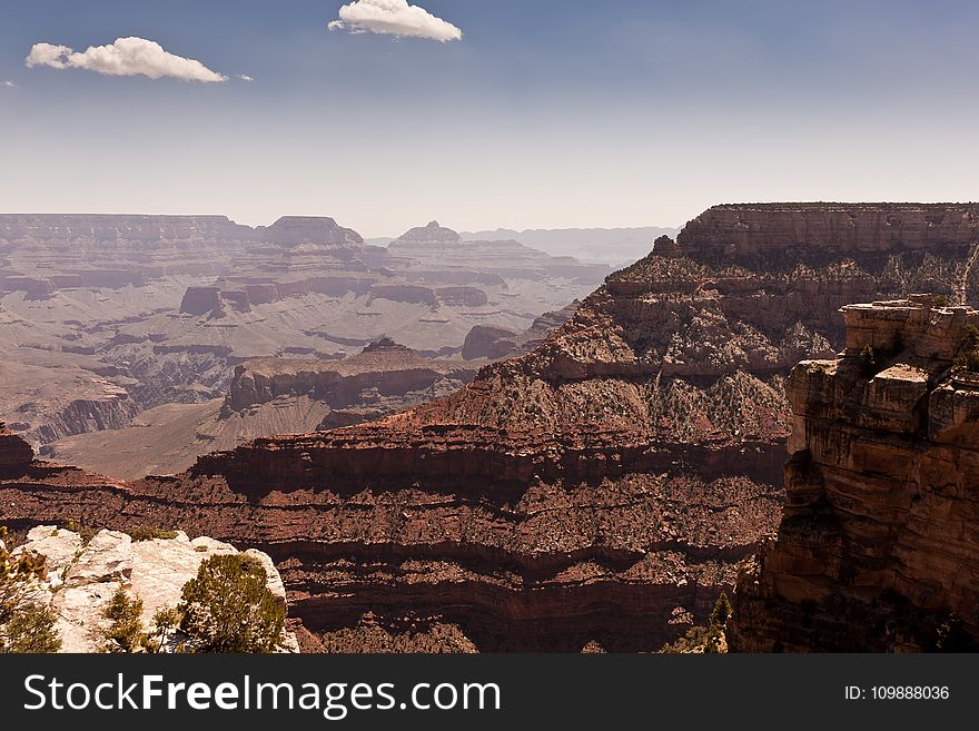 Grand Canyon Under Blue and White Cloudy Sky