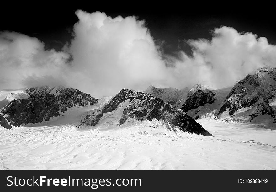 Snow Covered Mountain during Night Time