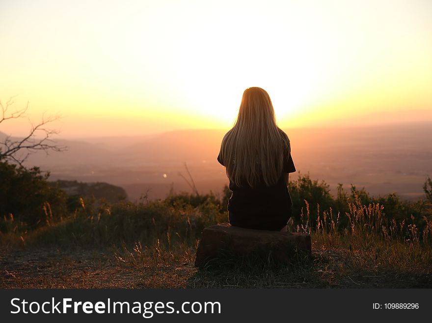 Woman Looking at Sunset