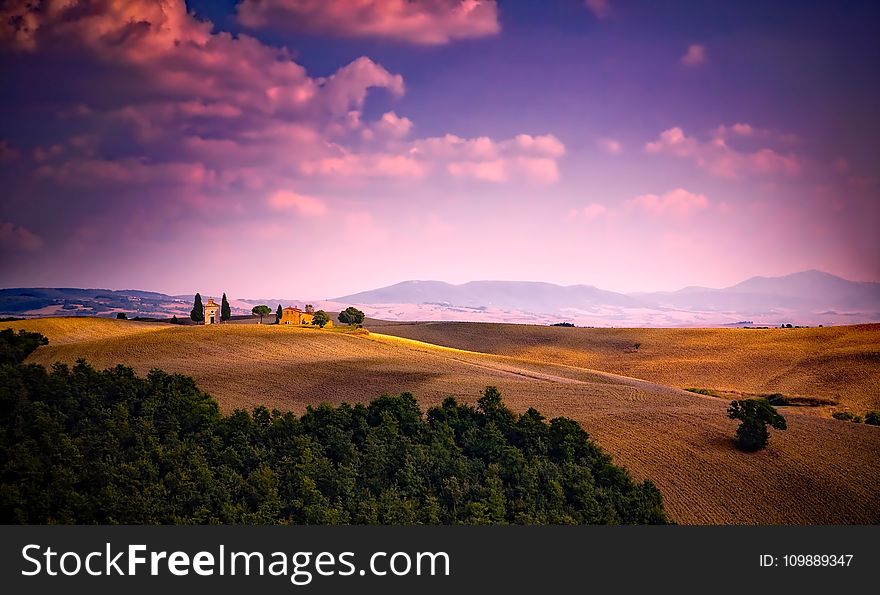 Scenic View of Landscape Against Dramatic Sky