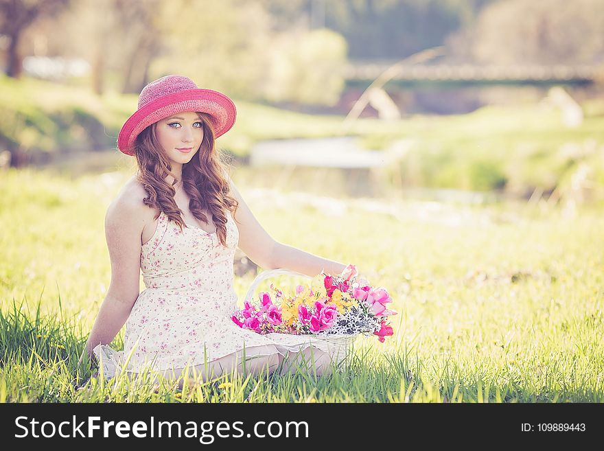 Portrait Of A Beautiful Young Woman In Field