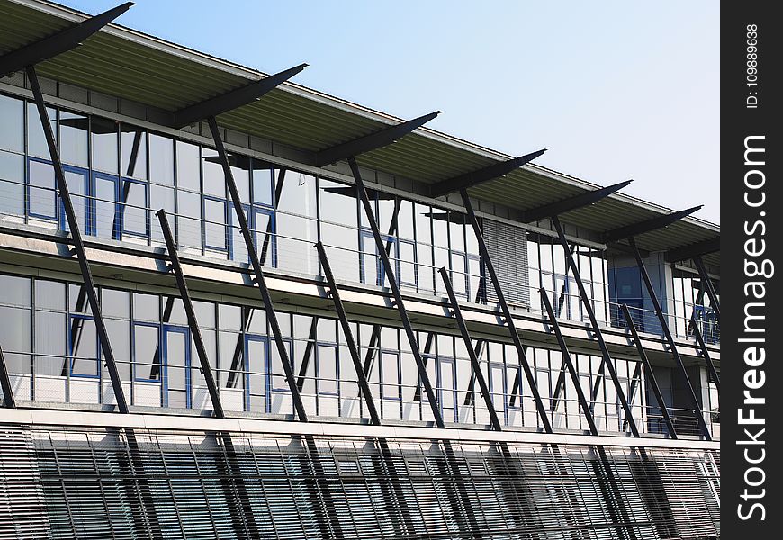 Low Angle View of Office Building Against Sky