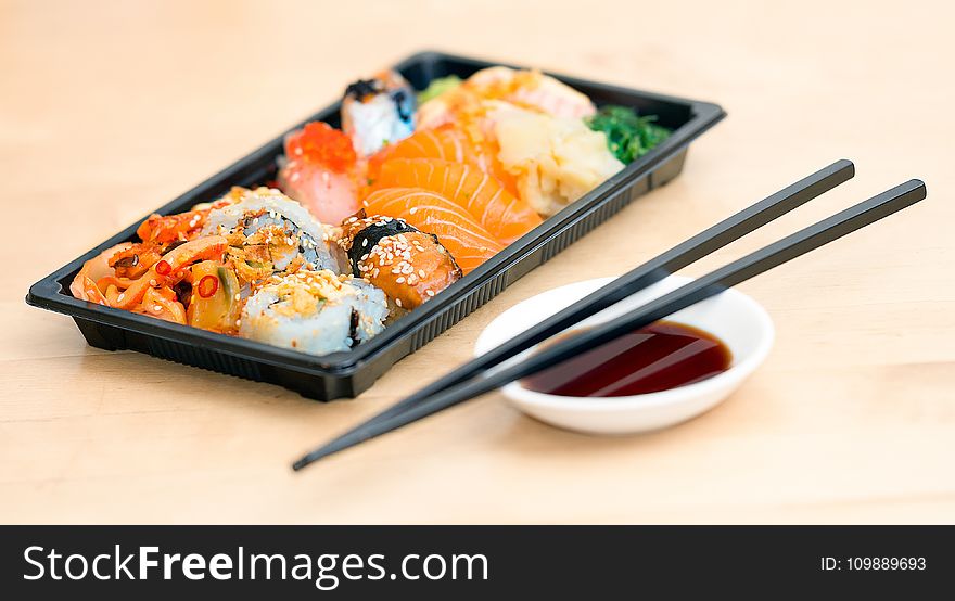 Close-up Photo Of Sushi Served On Table