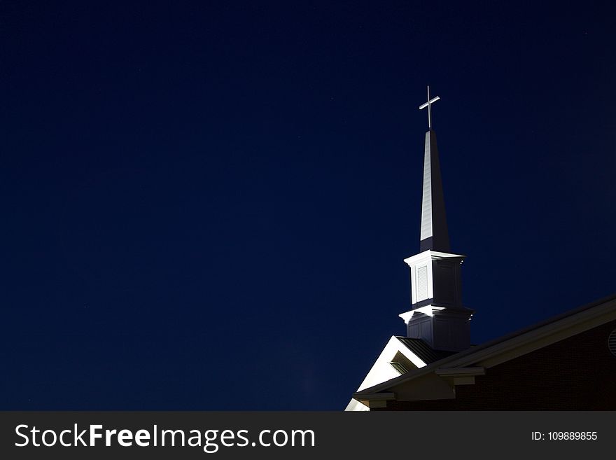 Low Angle View of Cross Against Sky at Night