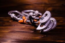 Camming Device Friend And Carabines For Rock Climbing On Wooden Royalty Free Stock Photos