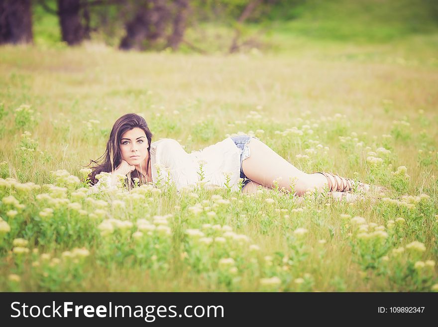 Woman Lying on Grass