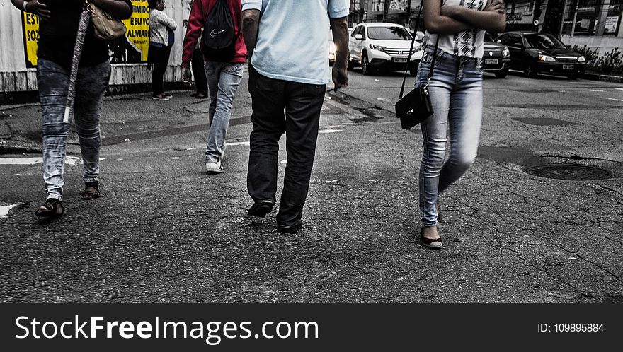 Person Wearing Black Denim Jeans And White Tops