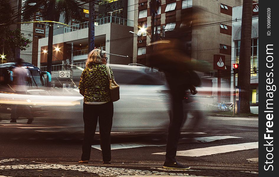 Time-lapse Photography Standing On Road