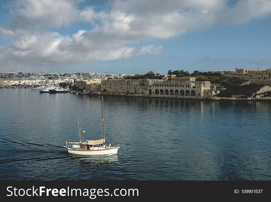 Boat, Buildings, Clouds