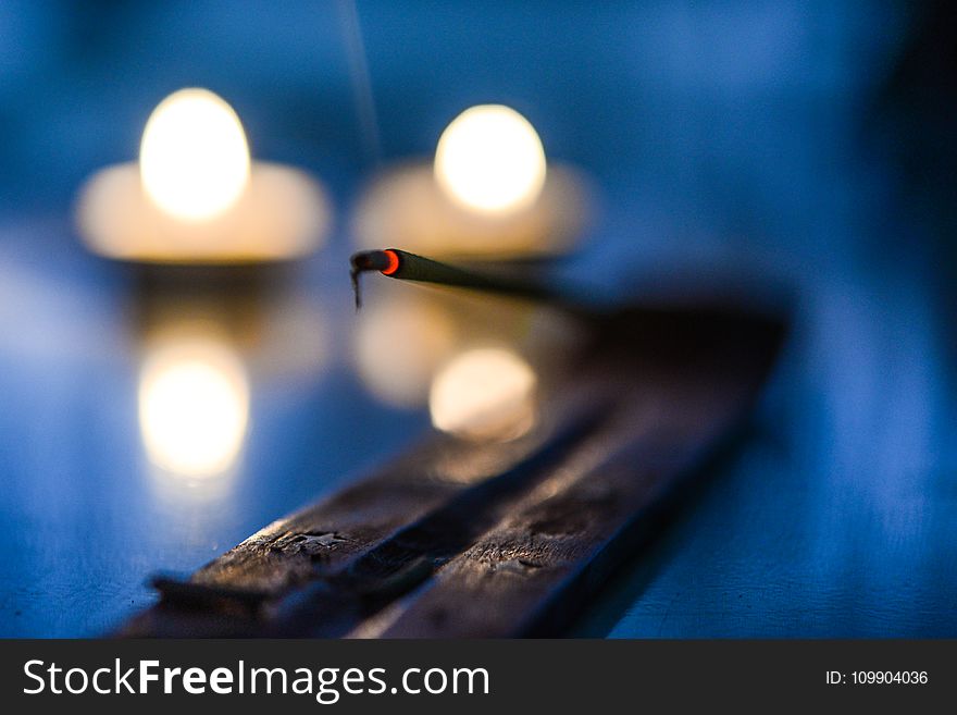 Bokeh Photography Of Black Stick