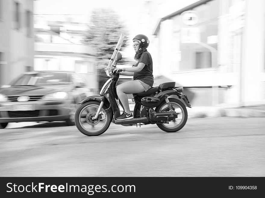 Woman Riding On Scooter Motorcycle