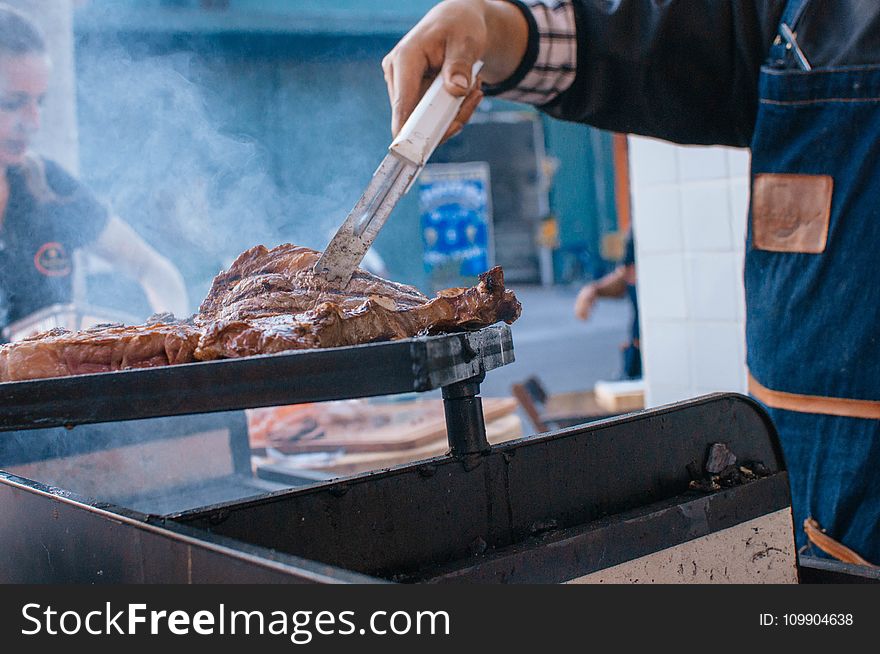 Man Cooking Beef