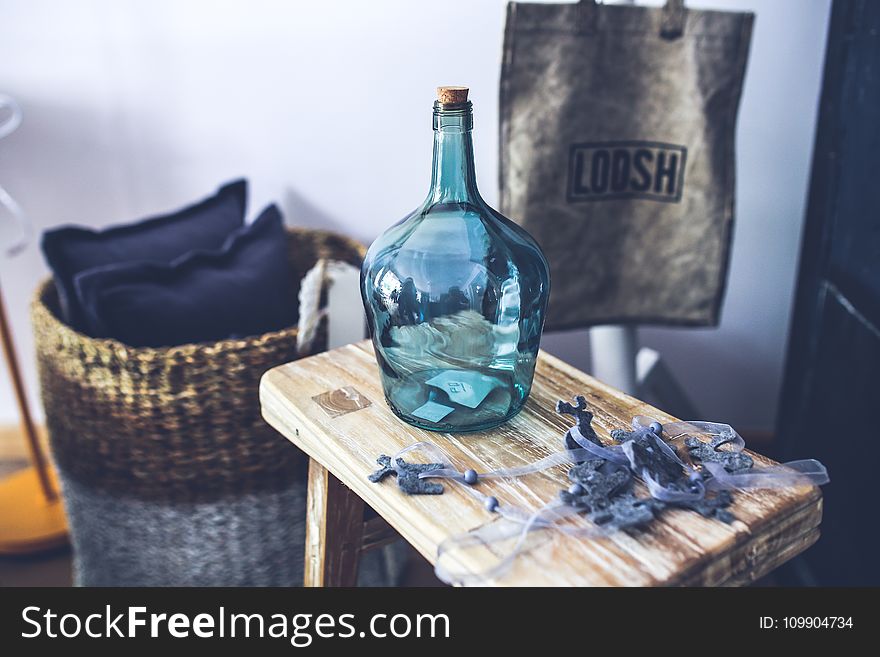 Blue carafe on the stool