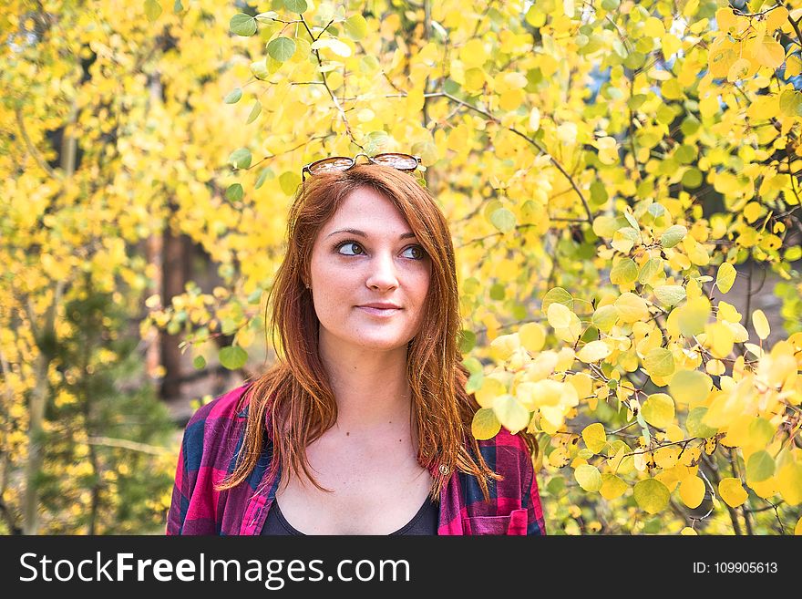 Woman Wearing Pink And Black Dress Shirt And Black Tank Top