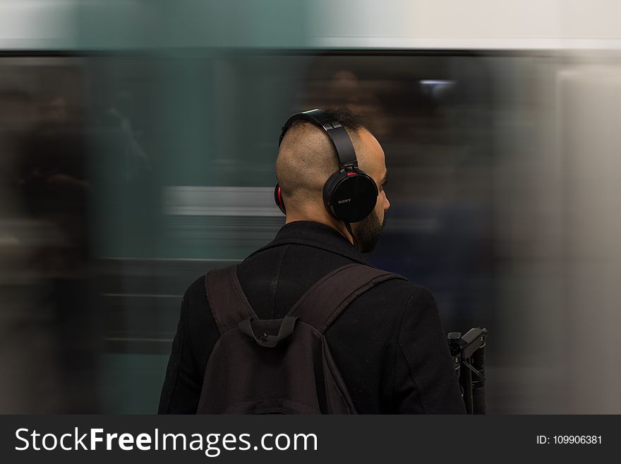 Man Wearing Black Headphones