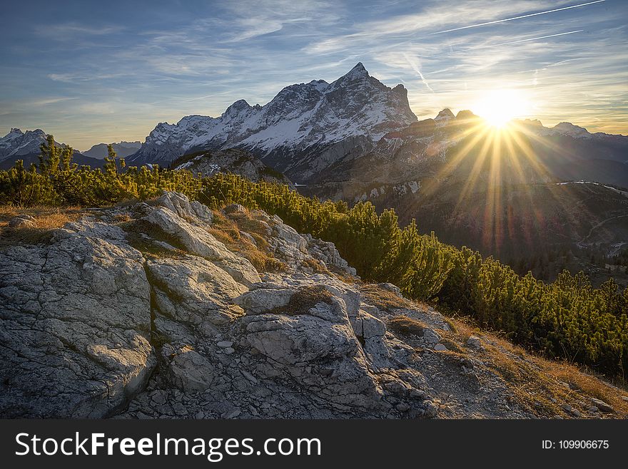 Snow Covered Mountain During Sunrise