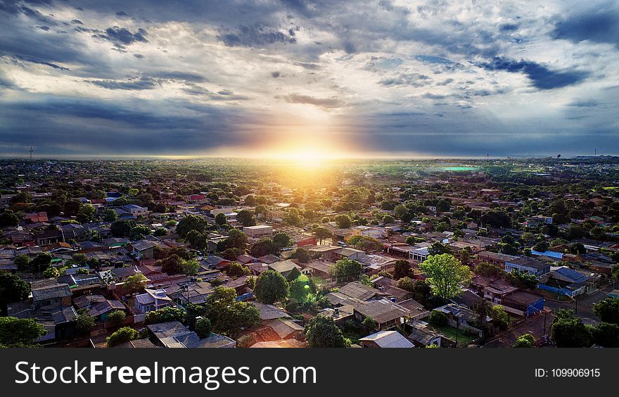 Aerial Photography of Buildings Under Blue and White Sky during Golden Hour