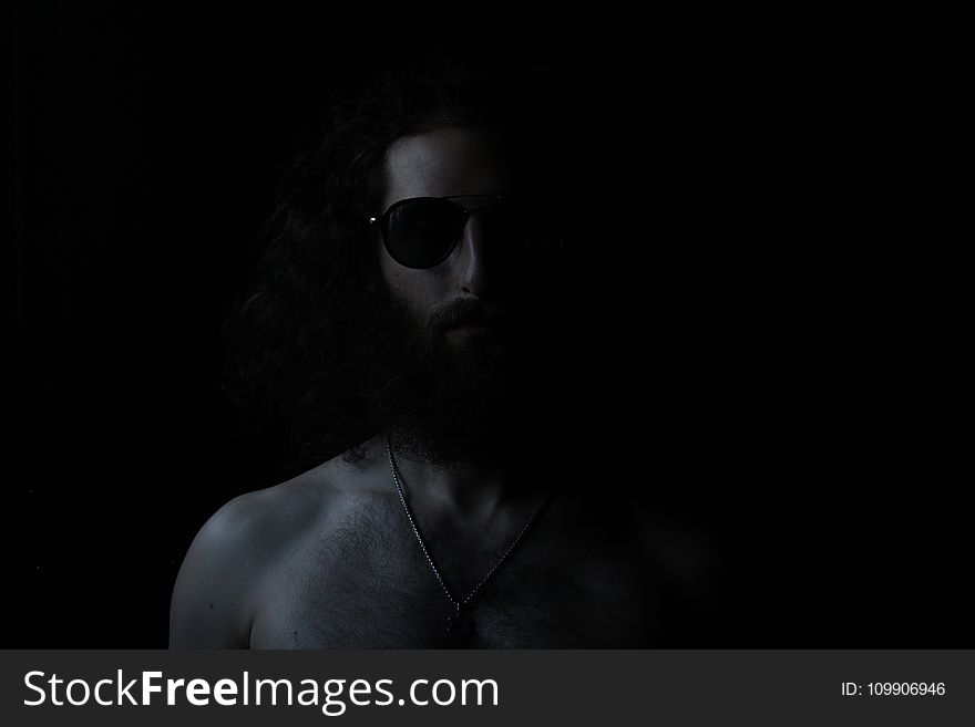 Grayscale Photography Of Topless Man Wearing Sunglasses