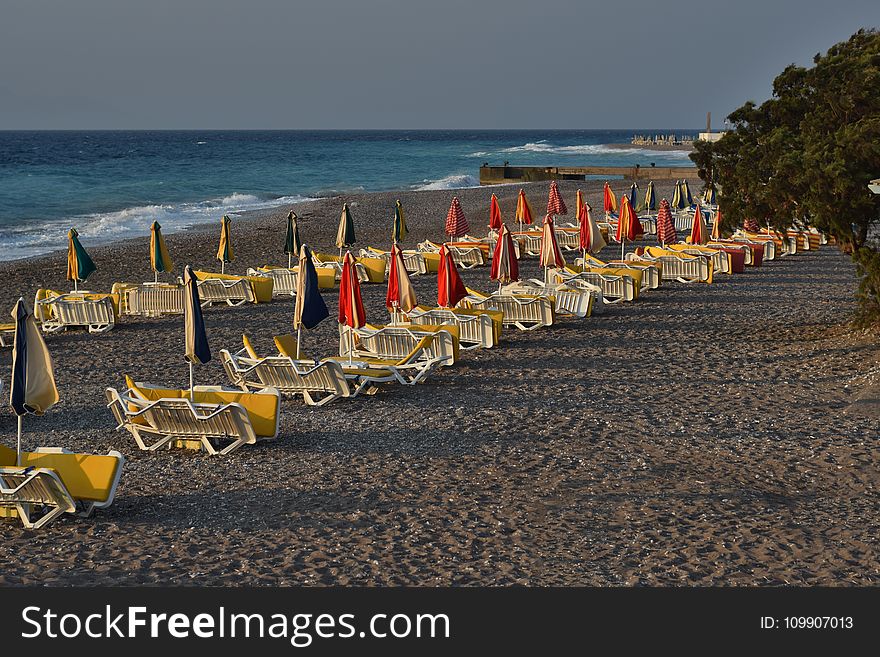 White Wooden Beach Patio Set at Daytime