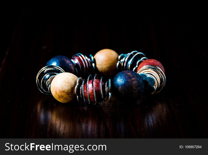 Blue, Red, Beige, and Silver Beaded Bracelet