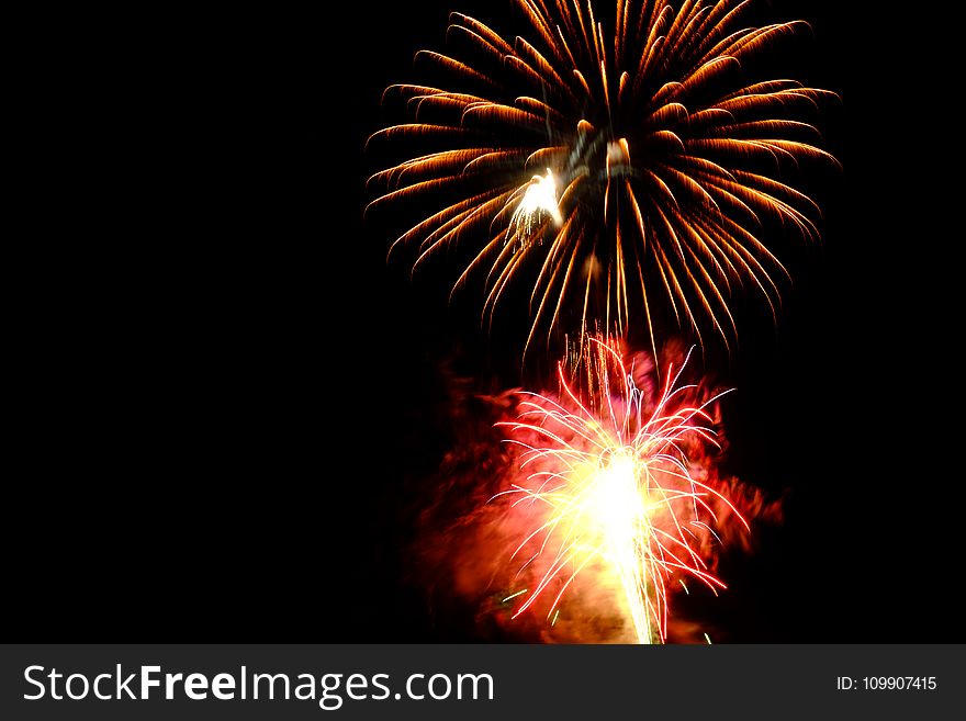 Red And Brown Fireworks Display Photo