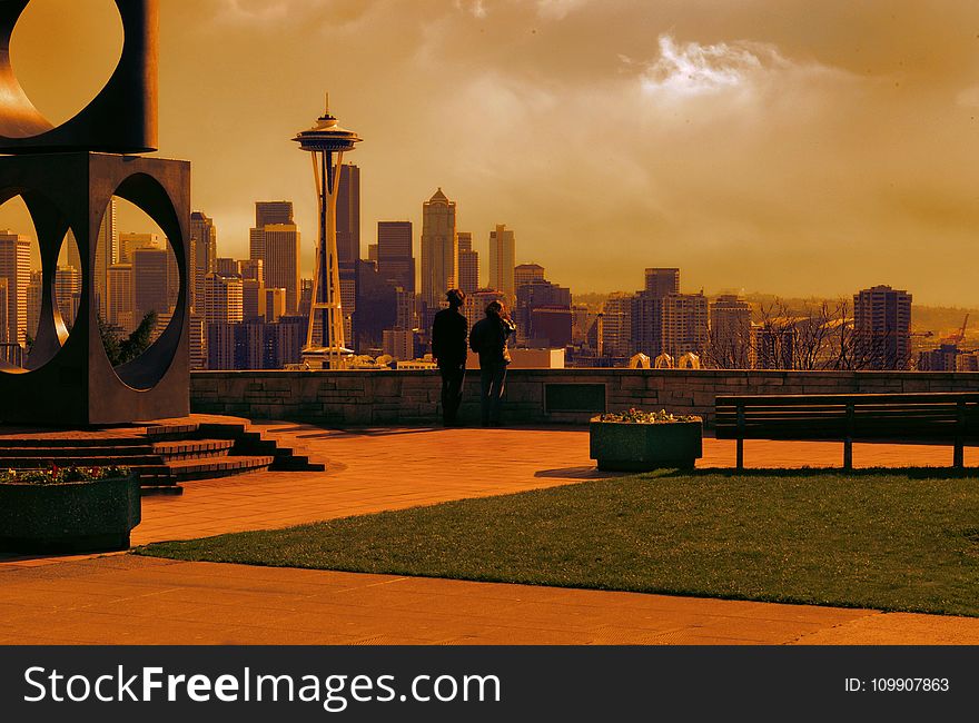 Man and Woman Looking at Space Needle Photo