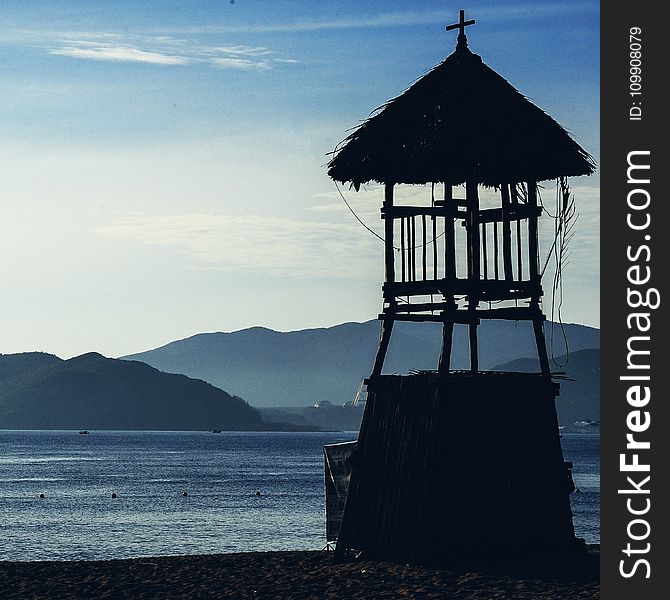 Silhouette Photo Of Wooden Guard House