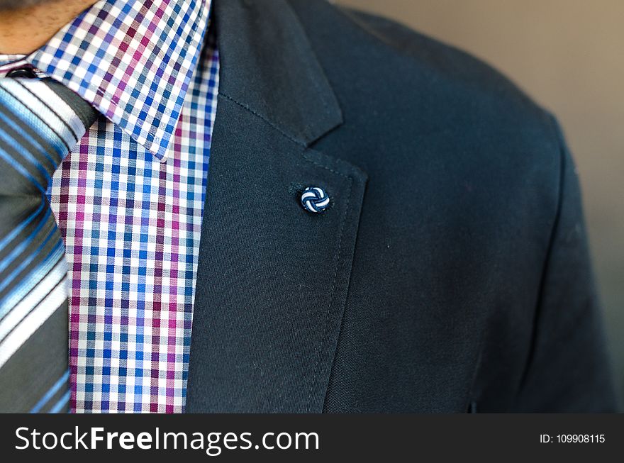 Closeup Photo of Man in Black Suit Jacket