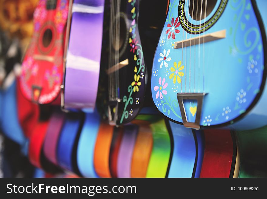 Blue, Purple And Green Acoustic Guitars