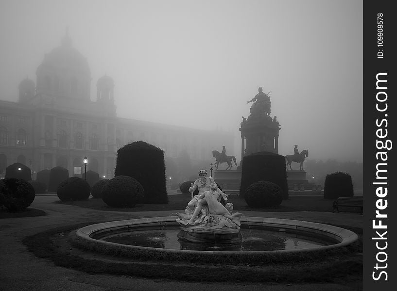 Two People Statue over Fog