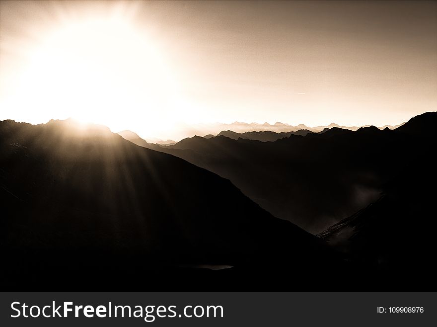 Photography of Mountains During Sunrise