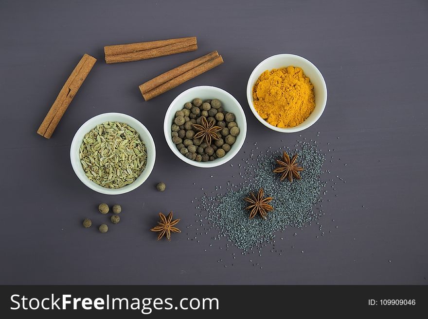 Assorted Spices Near White Ceramic Bowls