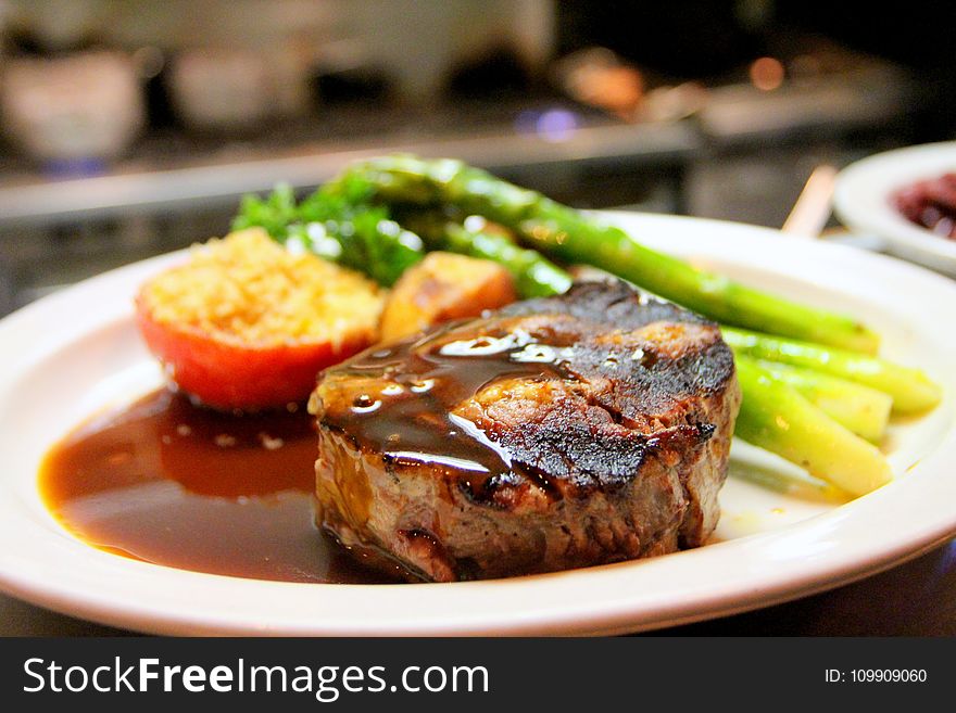 Selective Focus Photography of Beef Steak With Sauce