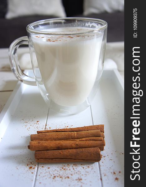 Cinnamon Sticks beside the Glass of Milk