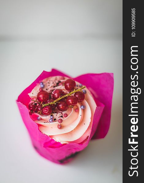 Cupcake With Red Berries On Top