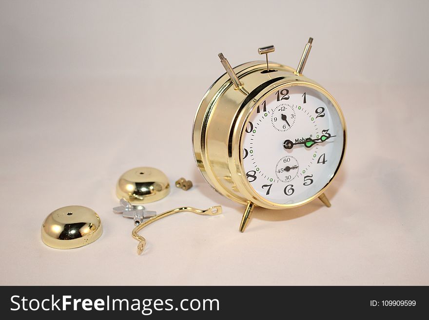 Round Brass and White Bell Alarm Clock
