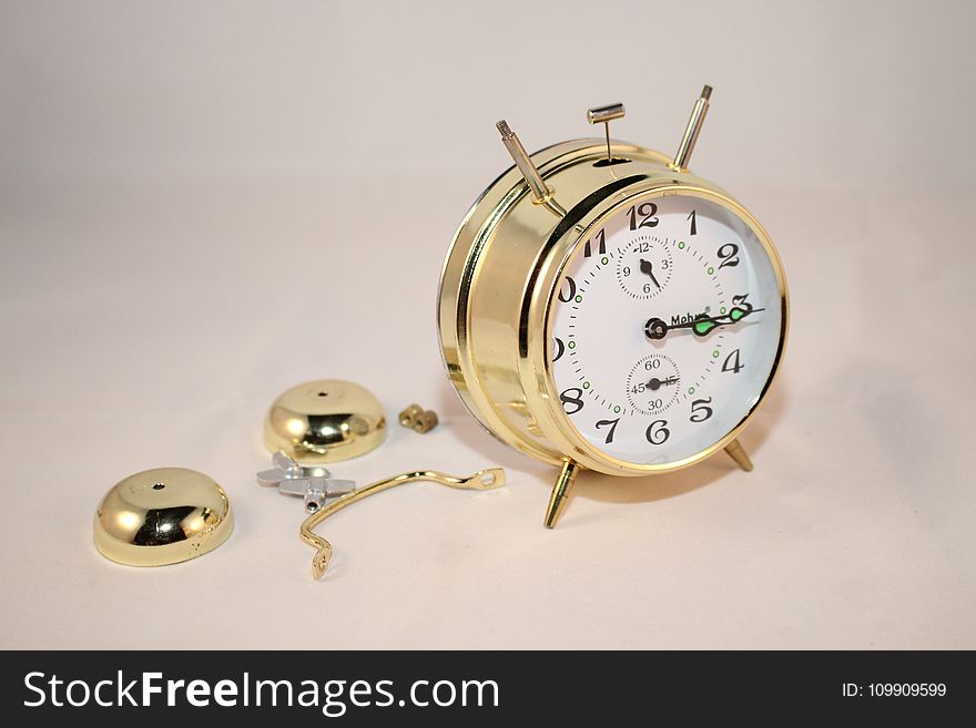 Round Brass And White Bell Alarm Clock