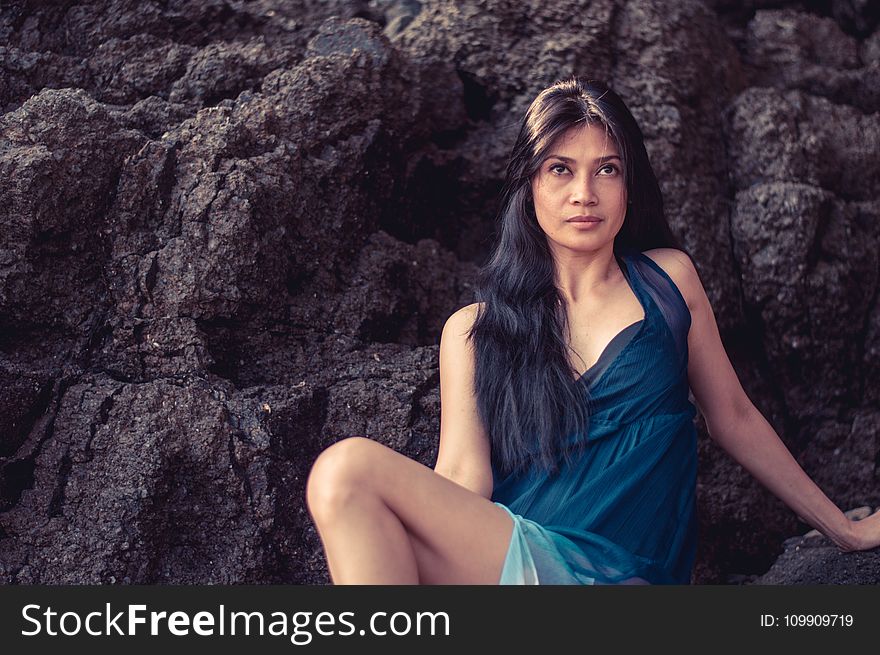 Woman Wearing Blue Sleeveless Dress