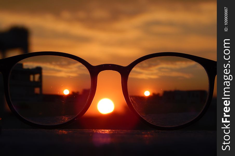 Close-up Photography of Eyeglasses at Golden Hour