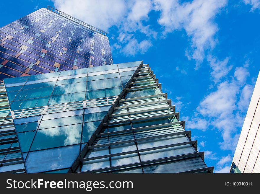 Glass Building Panels Under Blue Sky