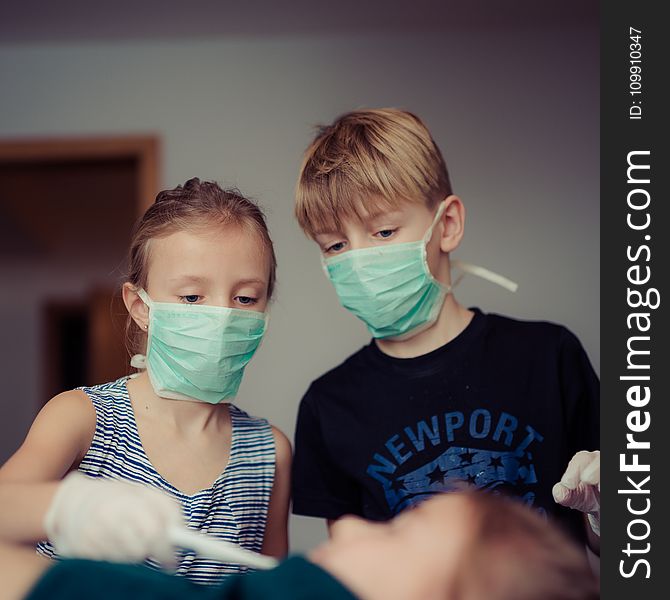 Two Children Wearing Surgical Masks