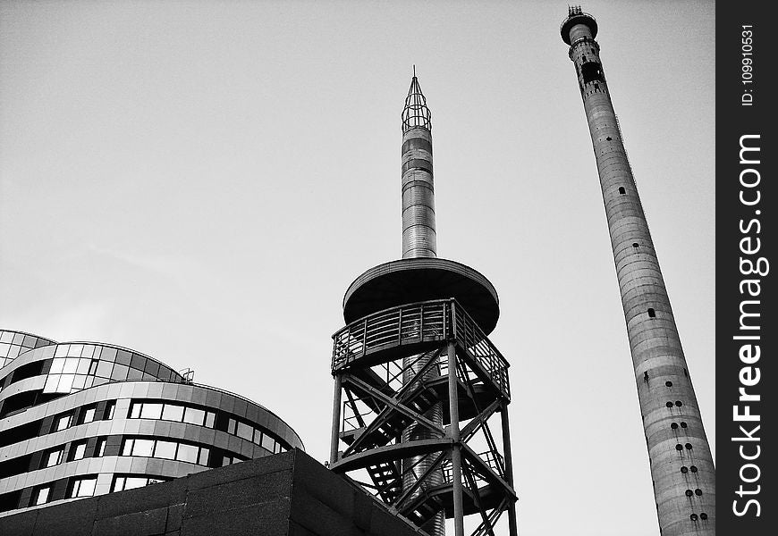 Grayscale Photograph of High-rise Tower