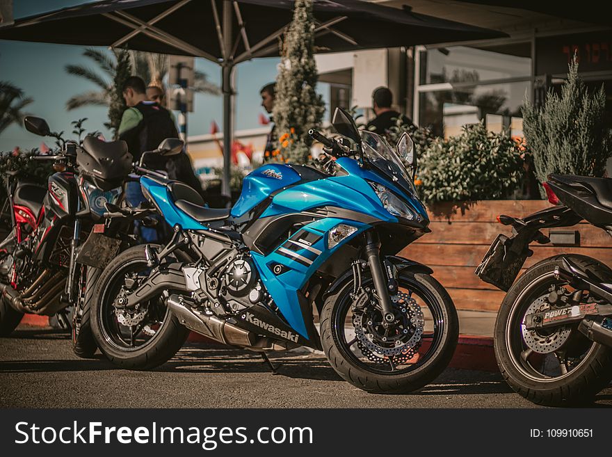 Photography of Motorcycles Parked on the Street