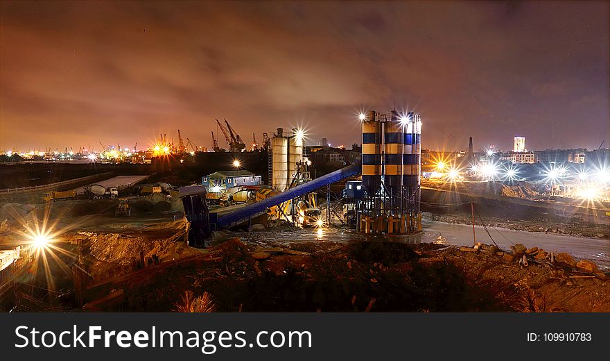 Photo Of High Raise Buildings During Night Time