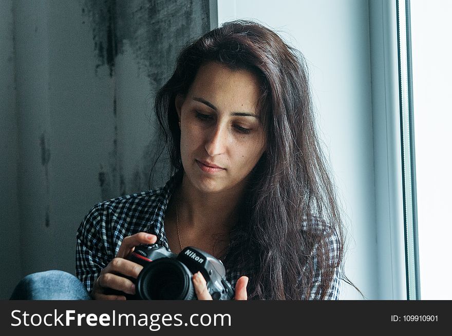 Woman Holding Nikon Dslr Camera