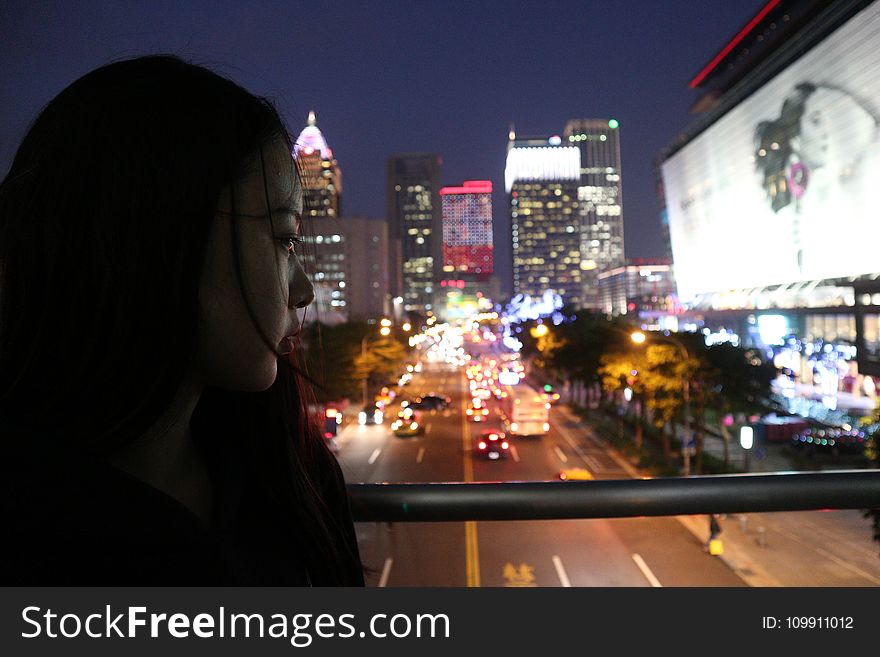 Woman Looking Down The Street