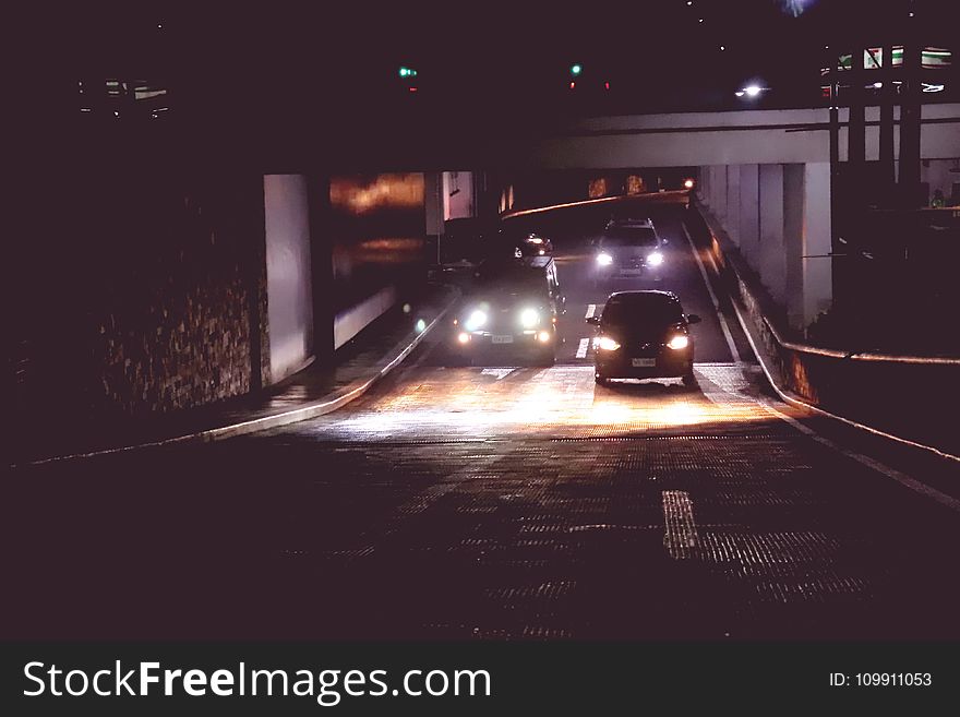 Photo of Cars in Tunnel during Nightime